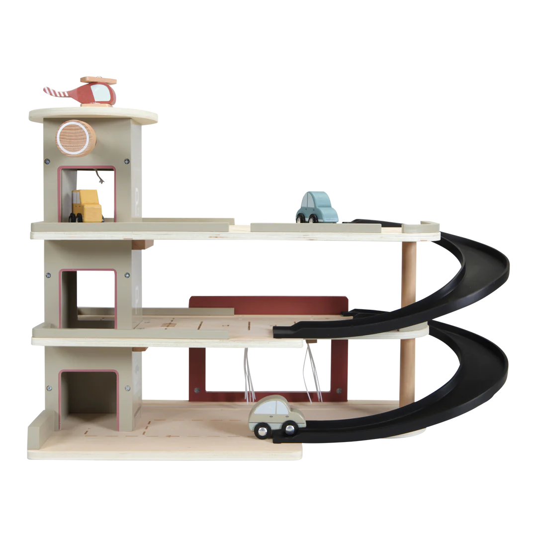 The Little Dutch Toy Garage has a ramp, several parking levels and a helicopter pad