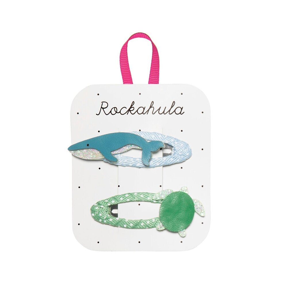 A pair of under the sea themed hair clips by Rockahula with a turtle and a whale