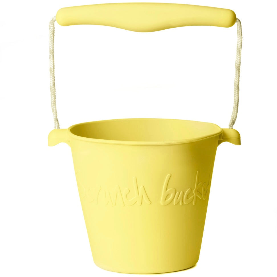 a soft lemon yellow silicone scrunch bucket