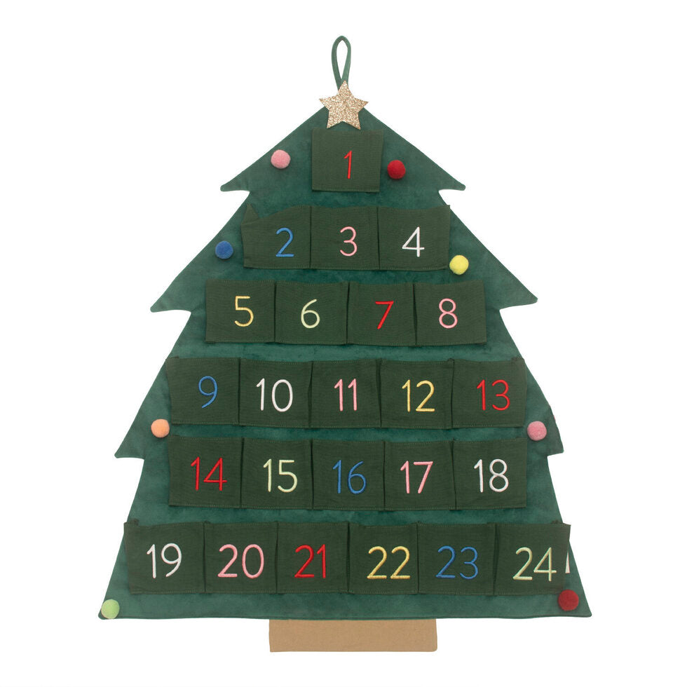 A green fabric advent calendar shaped like a Christmas tree with colorful numbers and a gold star topper, decorated with brightly colored pom poms.