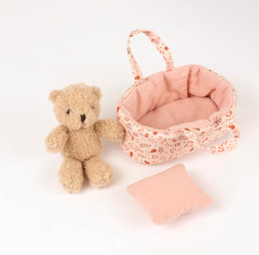 Mini Morris Teddy in a carry cot