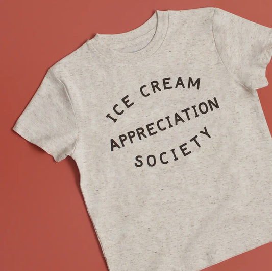 The perfect summer children’s t shirt screen printed with ice cream appreciation society in cookies and cream colours 