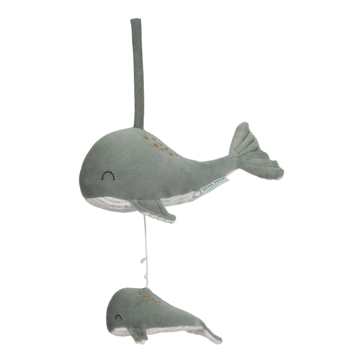 A neutral green whale musical toy for babies