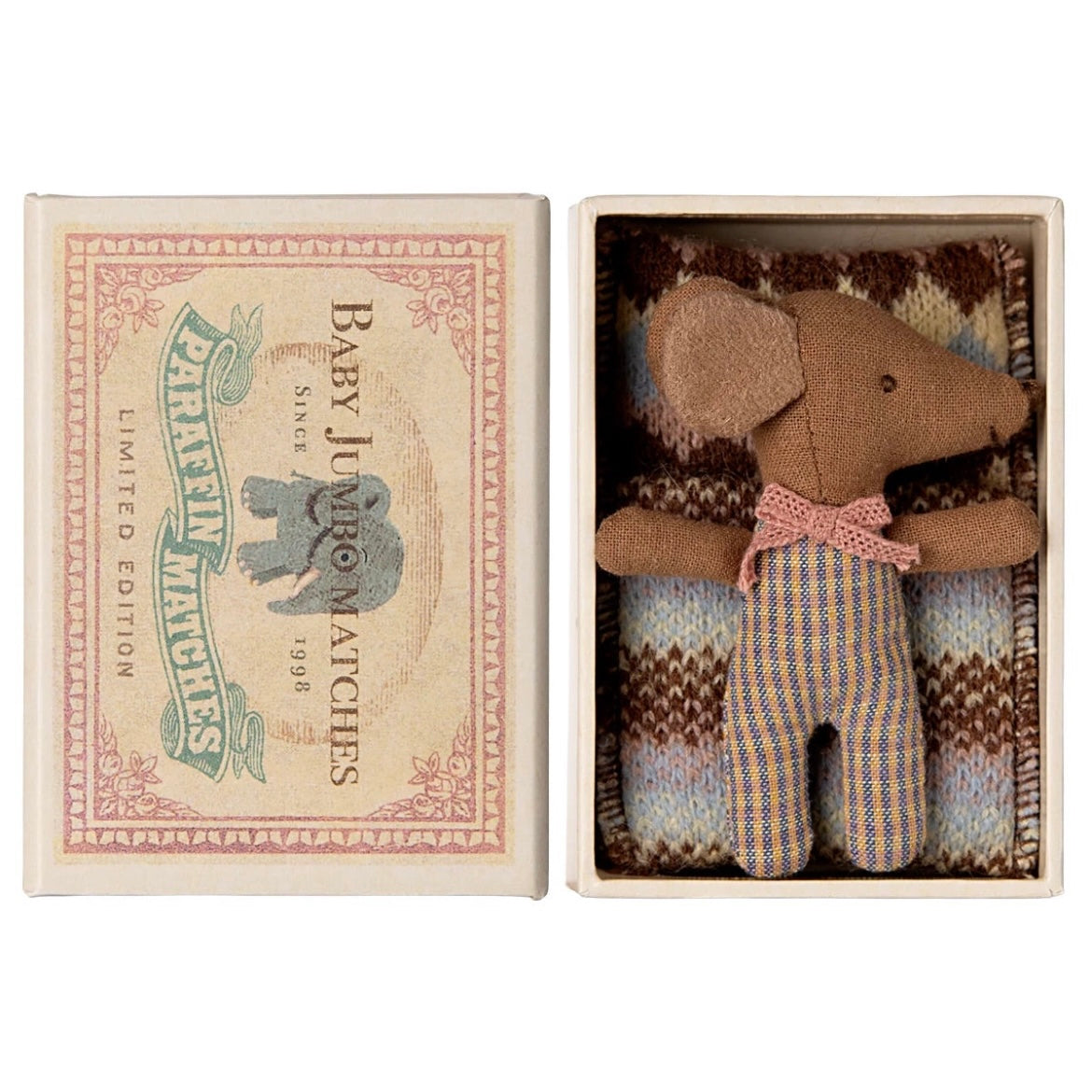 a little brown baby Maileg Mouse in a matchbox complete with bedding