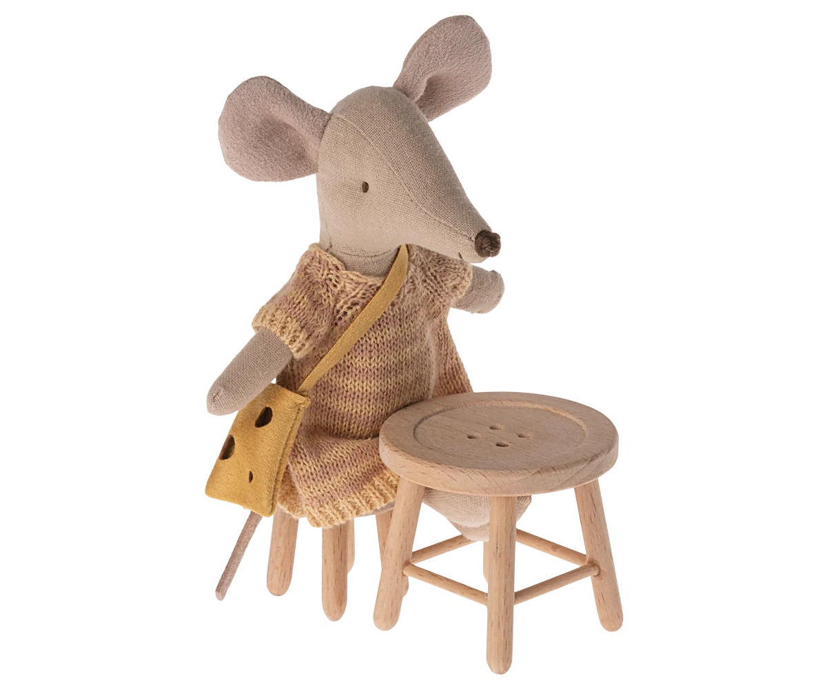 A wooden maileg table and stool set which mice can sit at