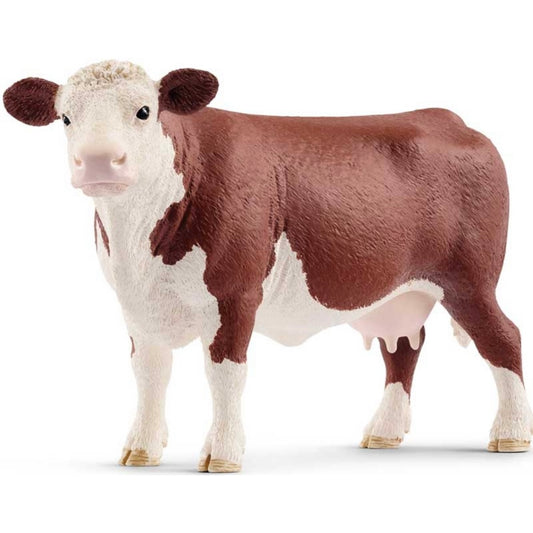 Schleich brown and white cow play figure
