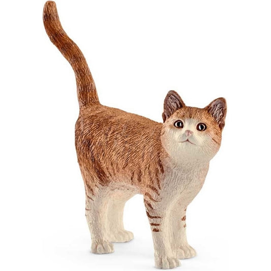Toy cat standing with tail in the air. White and orange, hand painted.