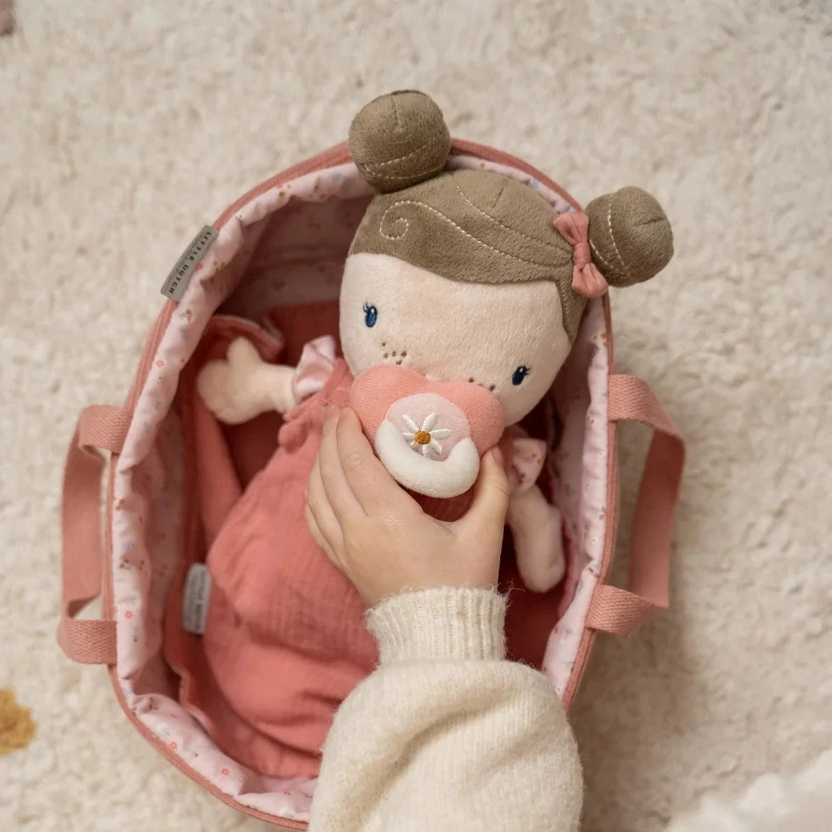 The Little Dutch Baby Rosa doll has lots of play value with a magnetic dummy